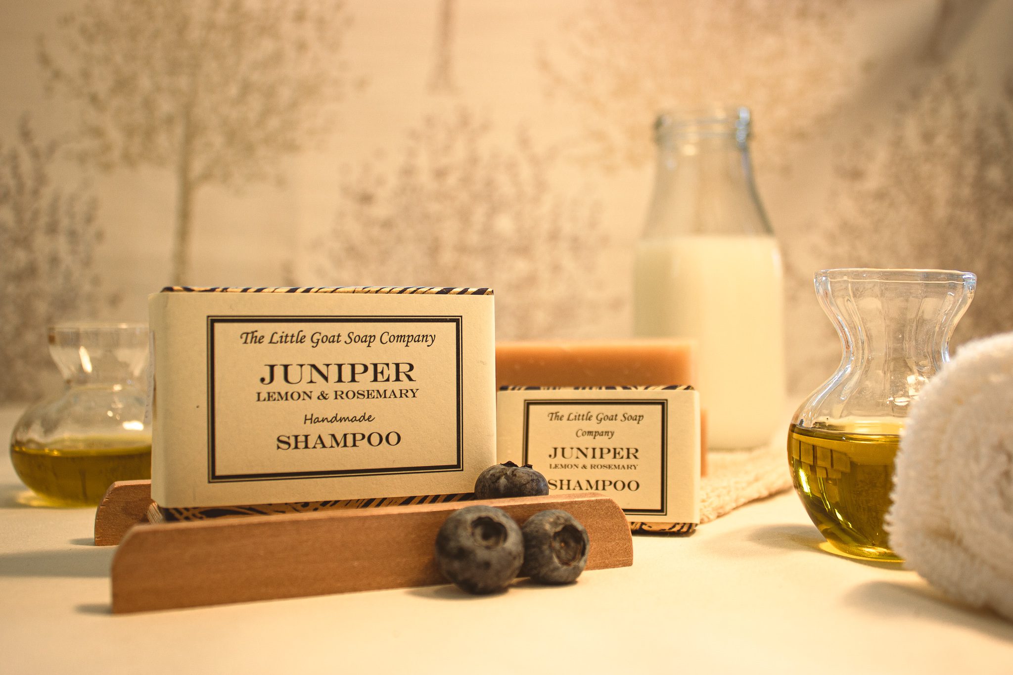 juniper lemon and rosemary shampoo bar by the little goat soap company